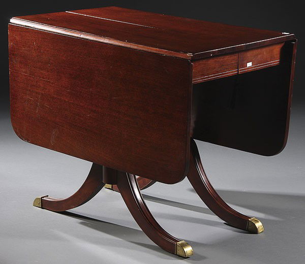 A DUNCAN PHYFE STYLE MAHOGONY DROP LEAF TABLE: A DUNCAN PHYFE STYLE MAHOGONY DROP LEAF TABLE, 20TH CENTURY. Height 30 inches, width 56 inches, depth 36 inches.