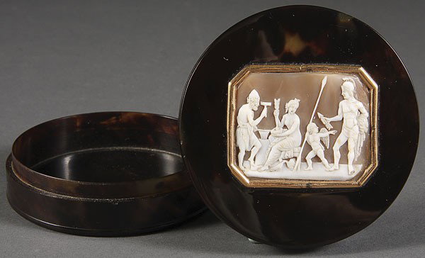 VICTORIAN CARVED AGATE CAMEO MOUNTED BOX,: A VICTORIAN CARVED AGATE CAMEO MOUNTED BOX, 19TH CENTURY. With neoclassic design of cupid, finely carved and contained within a gilt frame, mounted on a tortoise shell lidded round box. Diameter 3.5 i