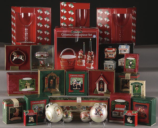 A HALLMARK KEEPSAKE ORNAMENT COLLECTION: A HALLMARK KEEPSAKE ORNAMENT COLLECTION, over 40 various ornaments contained in the original boxes together with holiday related crystal goblets and other decorations.