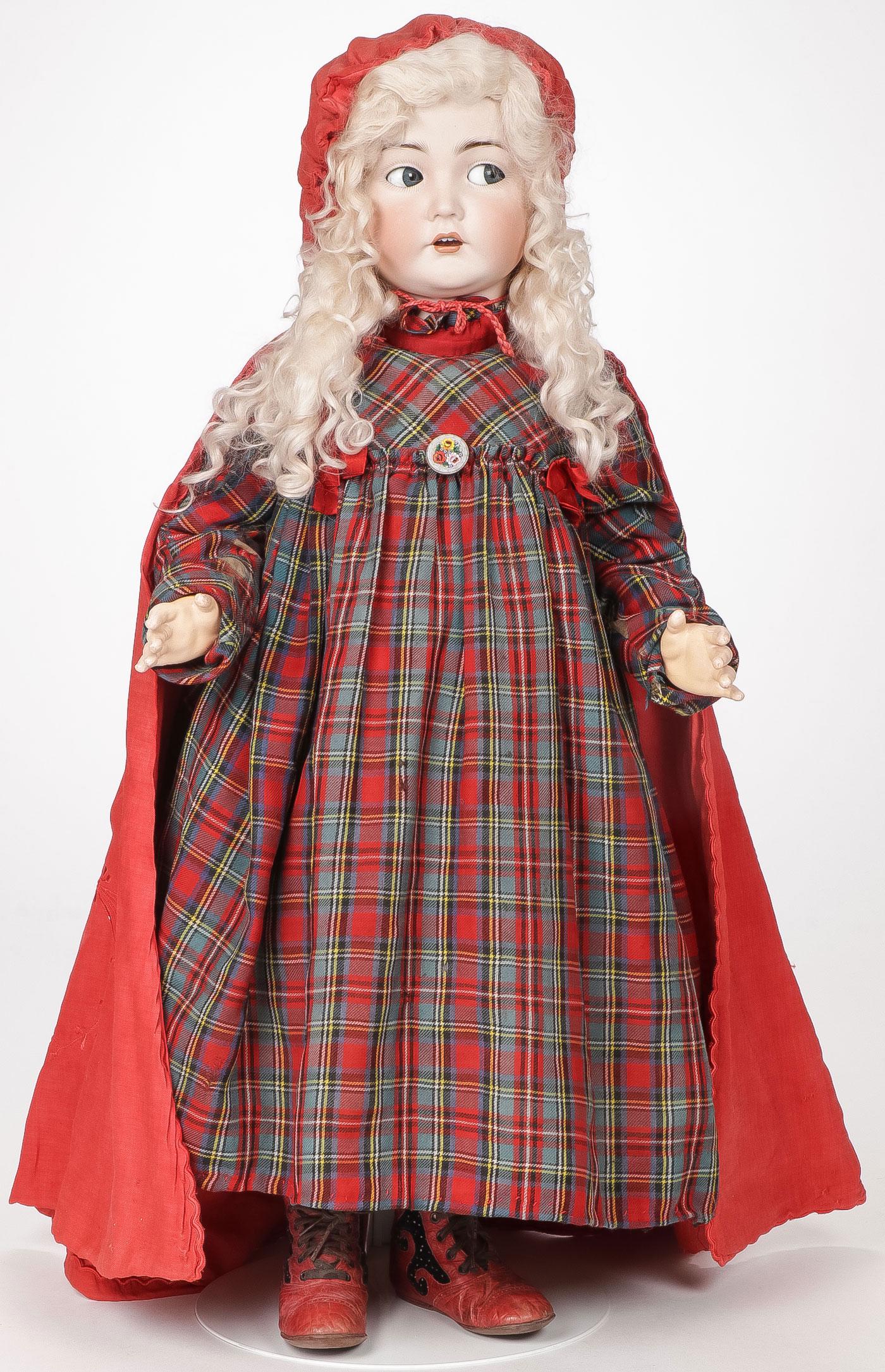 KAMMER & REINHART NO. 117/N CHARACTER DOLL: KAMMER & REINHART NO. 117/N CHARACTER DOLL. The bisque socket head with flirty eyes, exhibiting no chips, cracks, or hairlines, the teen body with no repair or repaint. Dressed as little red riding ho