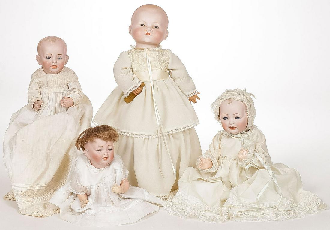 THREE GERMAN BISQUE BABY DOLLS: THREE GERMAN BISQUE BABY DOLLS. Various makers including J.D.K., A&M, and another, greatest measurement 16 inches.SHIPPING NOTICE:Jackson's is your sole and only source for one stop packing and ship