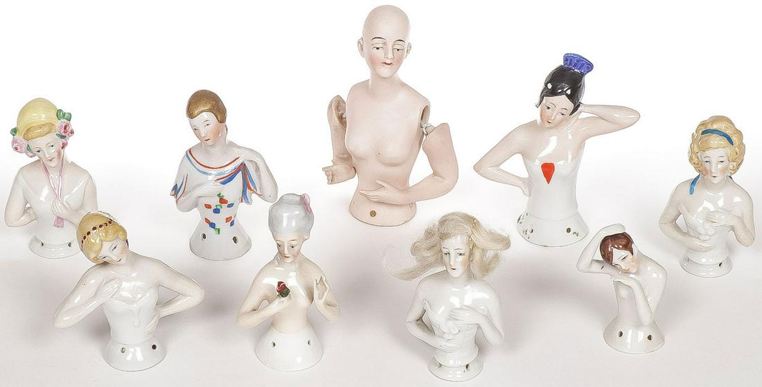 9 PORCELAIN HALF DOLLS: 9 PORCELAIN HALF DOLLS. Various models including one with natural hair. Greatest height 4.5 inches. SHIPPING NOTICE: Jackson's is your sole and only source for one stop packing and shipping. With over