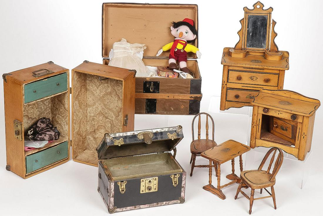 VINTAGE DOLL FURNITURE AND TRUNKS: VINTAGE DOLL FURNITURE AND TRUNKS. Comprising a charming matching 5-piece wooden set including a mirrored 2 drawer dresser, a commode, kitchen table and 2 chairs, as well as 3 doll trunks as shown. Gr