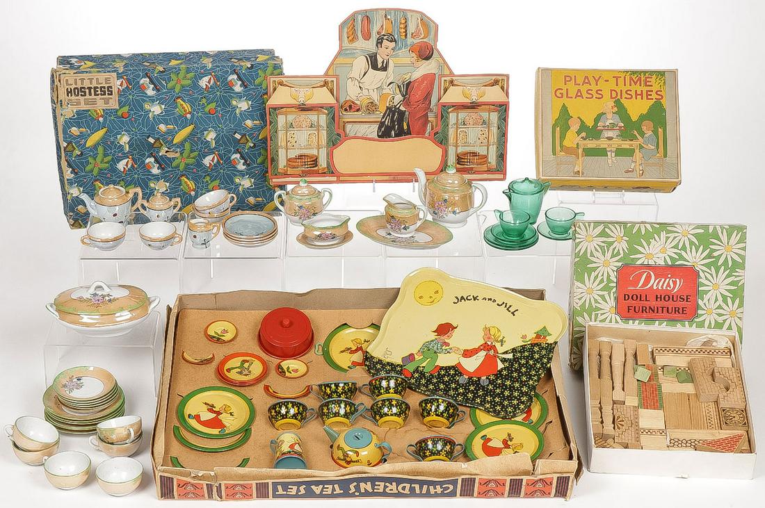 BOXED CHILDREN'S DISHES AND TOYS: BOXED CHILDREN'S DISHES AND TOYS. Comprising 4 sets of children's dishes in original boxes including a large children's tea set in tin litho by Ohio Art CO. (bottom row, center), a Little Hostess tea 