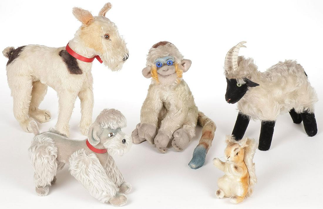 VINTAGE STEIFF ANIMAL GROUPING: VINTAGE STEIFF ANIMAL GROUPING. Comprising 5 individual Steiff figures including dogs, monkey, squirrel and goat as shown. Greatest height 11 inches. SHIPPING NOTICE: Jackson's is your sole and only s