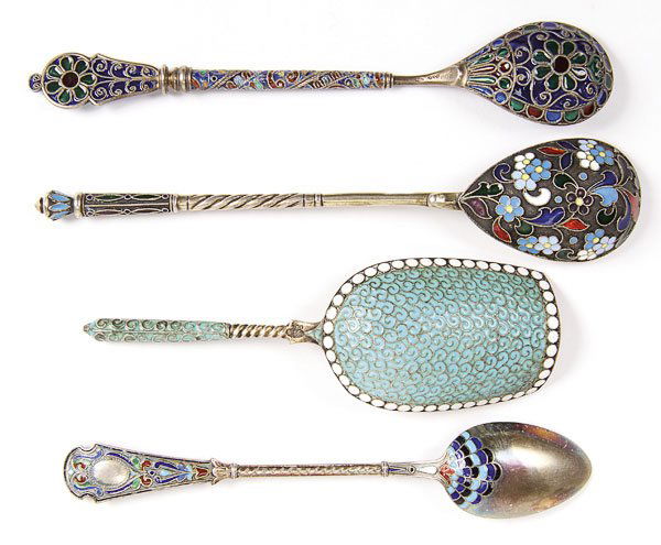 FOUR SILVER & ENAMELED SPOONS, CIRCA 1900: A GROUP OF FOUR RUSSIAN AND OTHER COUNTRIES SILVER AND ENAMELED SPOONS, CIRCA 1900. Including the 6th Artel and a Gustav Klingert sugar scoop. Greatest length 5.75 inches (14.5 cm).