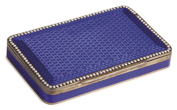 CONTINENTAL SILVER, SEED PEARL & ENAMEL CASE: A CONTINENTAL SILVER, SEED PEARL AND ENAMELED CASE, CIRCA 1900. With a rich sapphire blue translucent enamel over an engine turned ground set with a seed pearl bezel. Stamped ".925" Length 2.875 inche