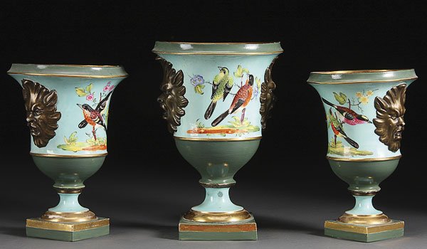 A FRENCH VEIUX PARIS PORCELAIN 3 PIECE GARNITURE: A GOOD VEIUX PORCELAIN THREE-PIECE GARNITURE 18TH CENTURY, Of bolted pedestal campagna form each finely painted with various birds and florals on verso flanked by bronze painted zoomorphic facial mask