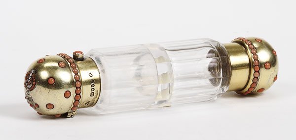 ENGLISH CORAL SILVER & CRYSTAL DOUBLE PERFUME: A FINE ENGLISH SILVER-GILT CRYSTAL AND CORAL MOUNTED DOUBLE PERFUME, LONDON, 1861. The panel cut double crystal perfume with hinged mushroom shape caps set with a coral, seed pearl and diamond G I mon