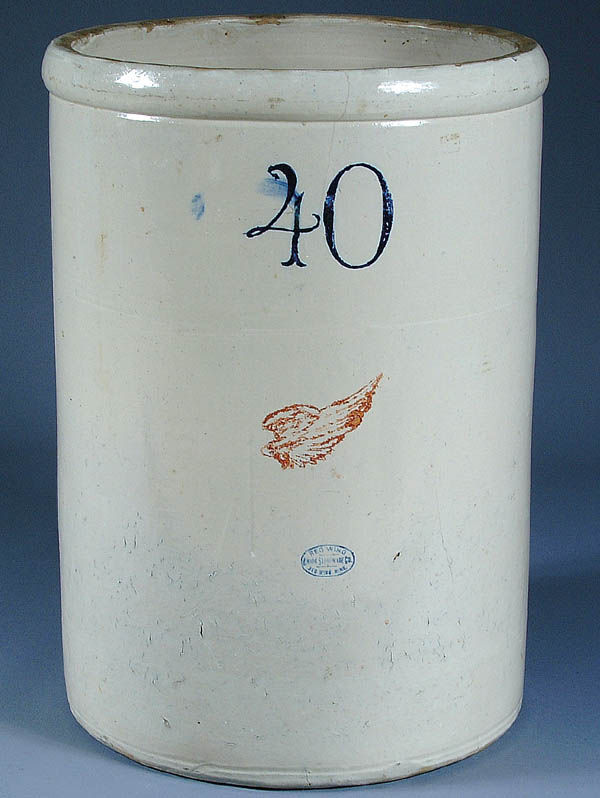 A REDWING 40 GALLON CROCK with no handles, large: A REDWING 40 GALLON CROCK with no handles, large wing and blue oval "Union Stoneware Co." mark. Small hairline crack. Height 31". Estimate $500-$700