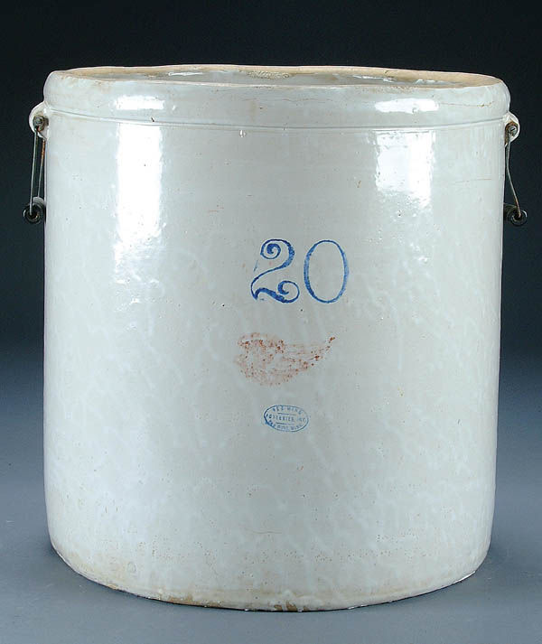 A REDWING 20 GALLON CROCK with small wing and blu: A REDWING 20 GALLON CROCK with small wing and blue oval marked "Potteries Inc." Height 21". Estimate $200-$400