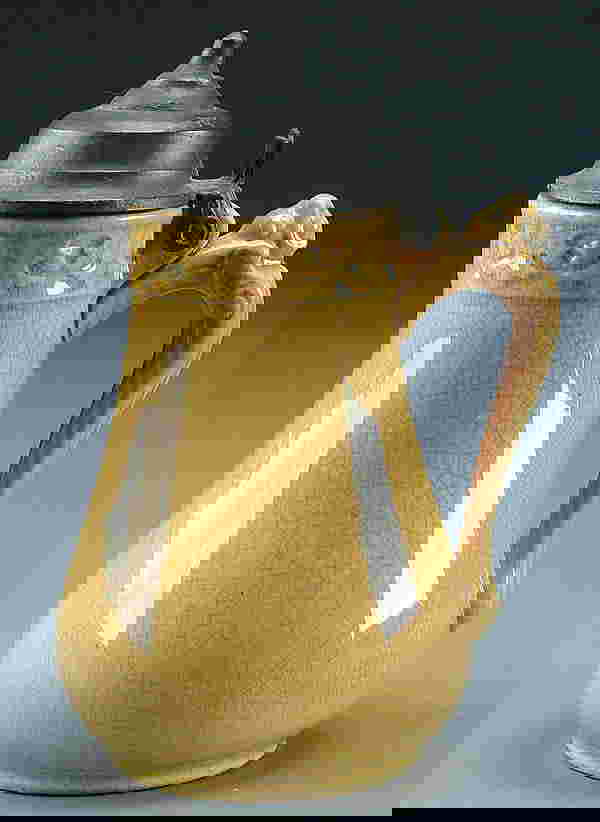 410 A YELLOW WARE SYRUP PITCHER mid 19th century In 410 A YELLOW WARE SYRUP PITCHER mid 19th century In