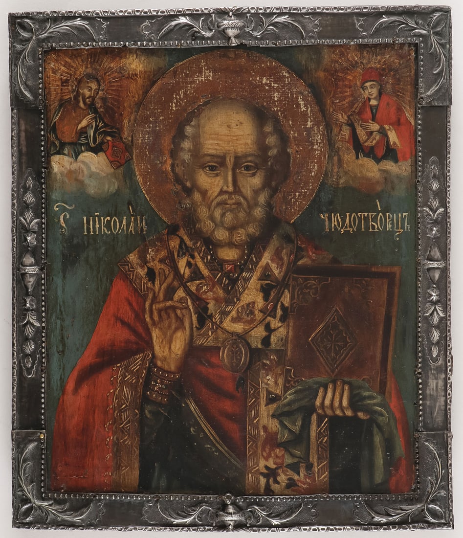 RUSSIAN ICON OF ST. NICHOLAS, C. 1800: RUSSIAN ICON OF ST. NICHOLAS, C. 1800 Naturalistically rendered, here Nicholas is depicted in elaborately embroidered vestments, delivering a blessing, holding a book of Gospels and at upper left Chri