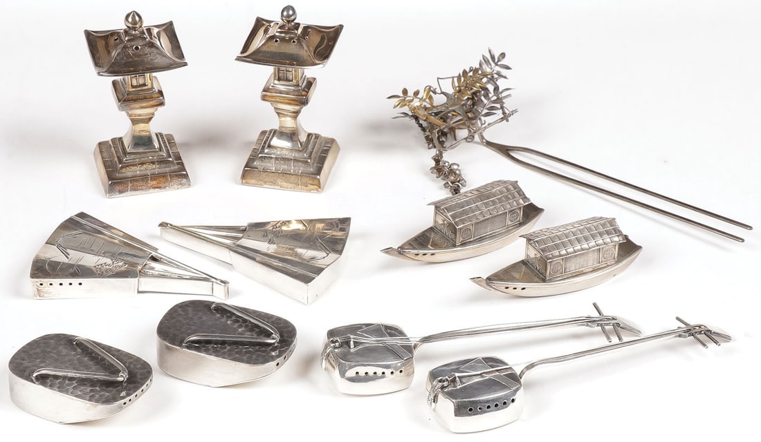 JAPANESE SILVER FIGURAL SHAKERS: JAPANESE SILVER FIGURAL SHAKERS Comprising five matching sets, including fans, shamisens, boats, sandals, and lanterns. Together with a Japanese silver gilt Gasha hair ornament. Greatest length 6 inch