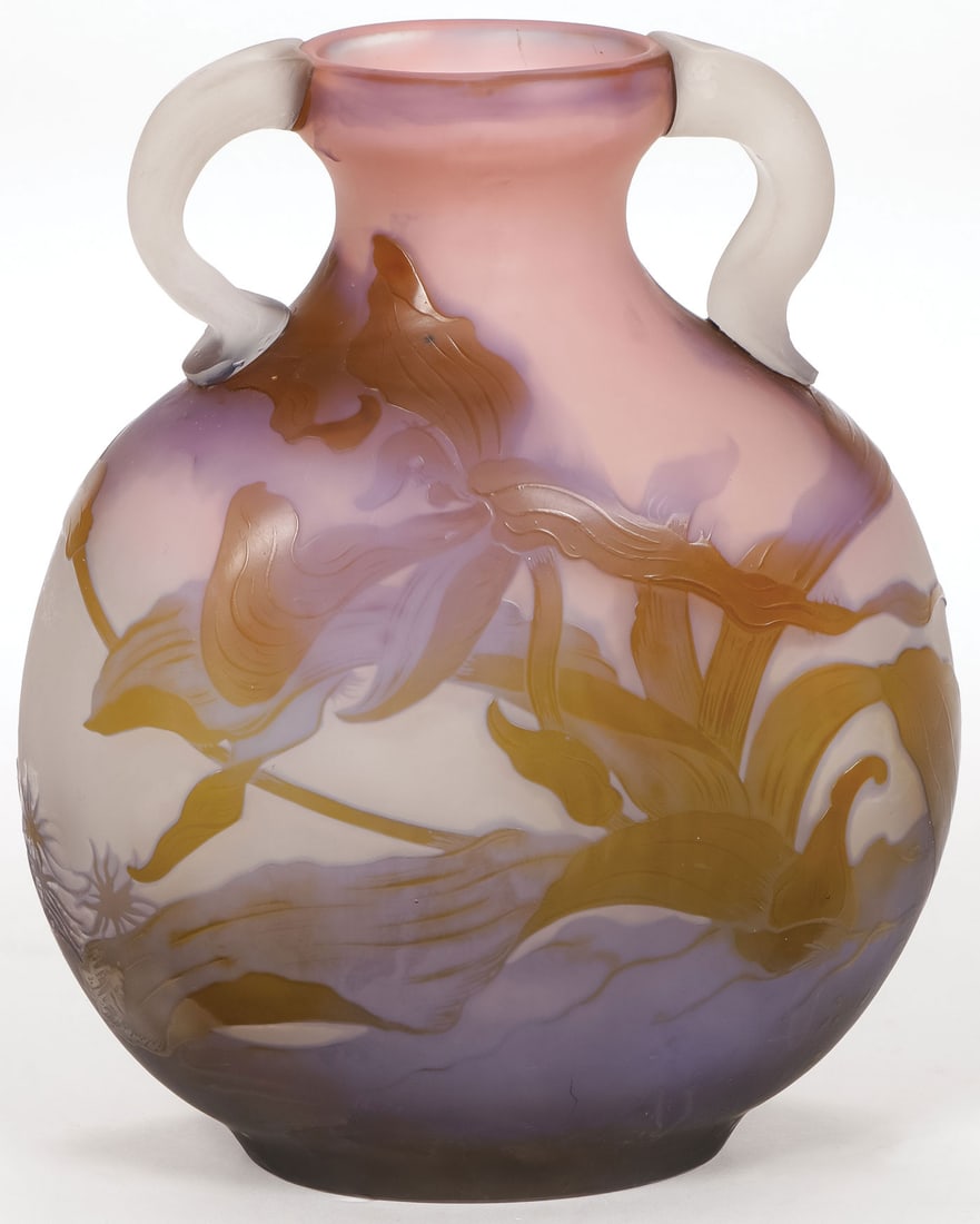 LOVELY GALLE CAMEO ORCHIDS VASE: LOVELY GALLE CAMEO ORCHIDS VASE The pillow form vase with spread mouth and double handles, the sides carved with orchids cut back to purple and pink and with polished highlights, signed on base, and w
