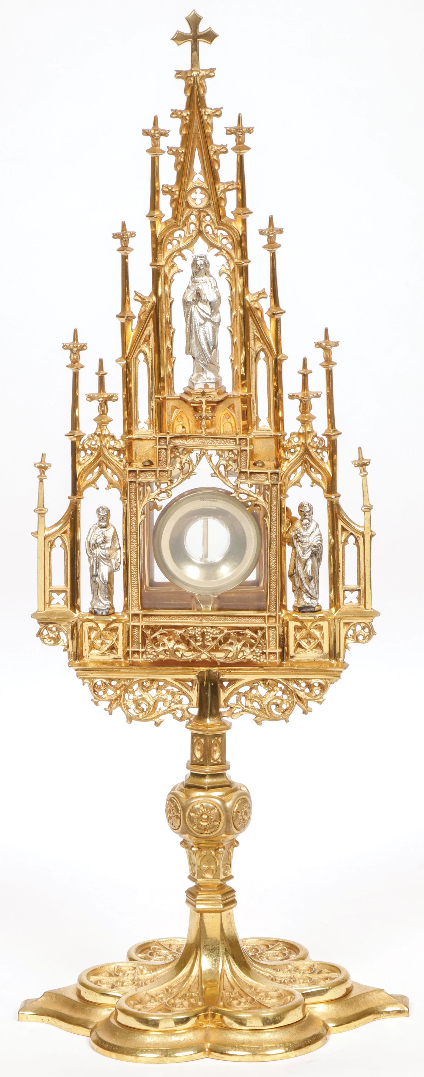 GOTHIC GILT BRONZE MONSTRANCE W/CASE: GOTHIC GILT BRONZE MONSTRANCE W/CASE Comprising an ornate and heavily gilded architectural form Gothic style framework. The exposition window flanked with silvered figures of Saint Peter and Saint Pau