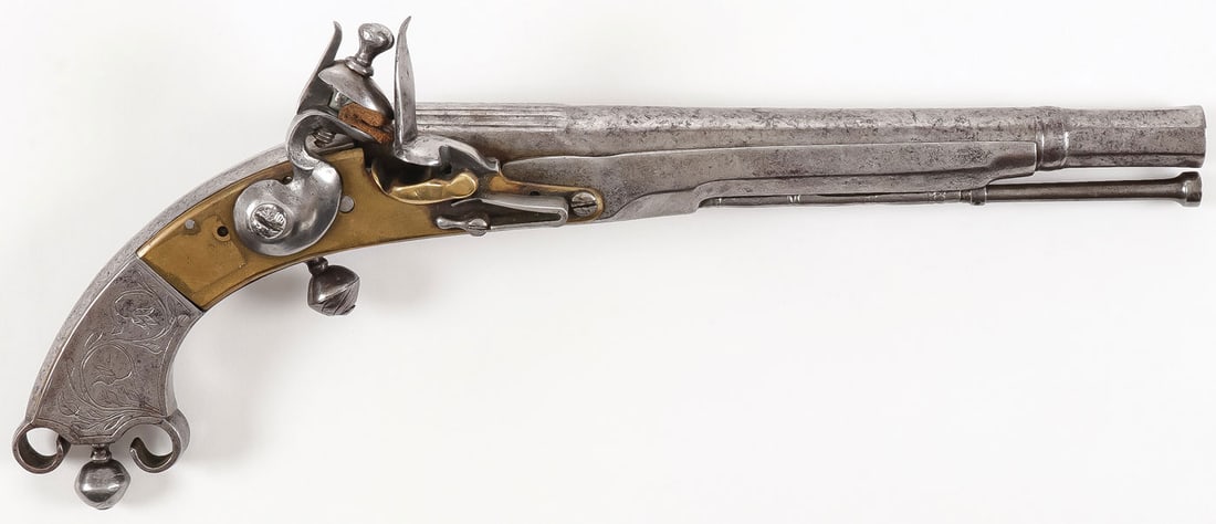 SCOTTISH FLINTLOCK STEEL BELT PISTOL: SCOTTISH FLINTLOCK STEEL BELT PISTOL 9 inch barrel with flared muzzle, button trigger, threaded pricker, brass lock plate, steel ramrod and belt hook. Apparently unmarked. Overall length 13 inches. SH