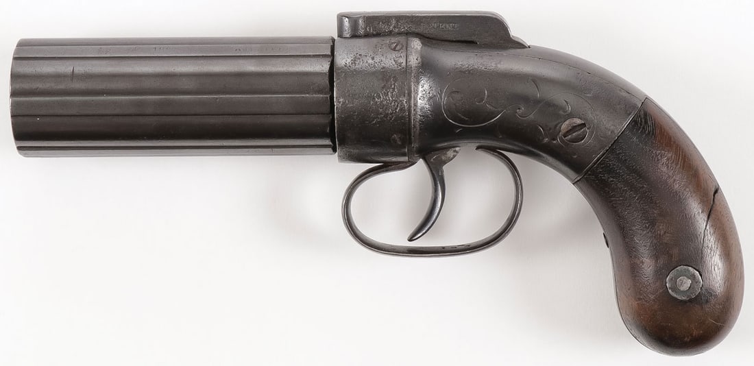 ALLEN & THURBER PEPPERBOX PISTOL: ALLEN & THURBER PEPPERBOX PISTOL In .31 caliber, with six round cluster fluted barrels measuring 3.25 inches, walnut bag shaped grips, iron mounted with scrolling foliate engraved frame. Marked on ham