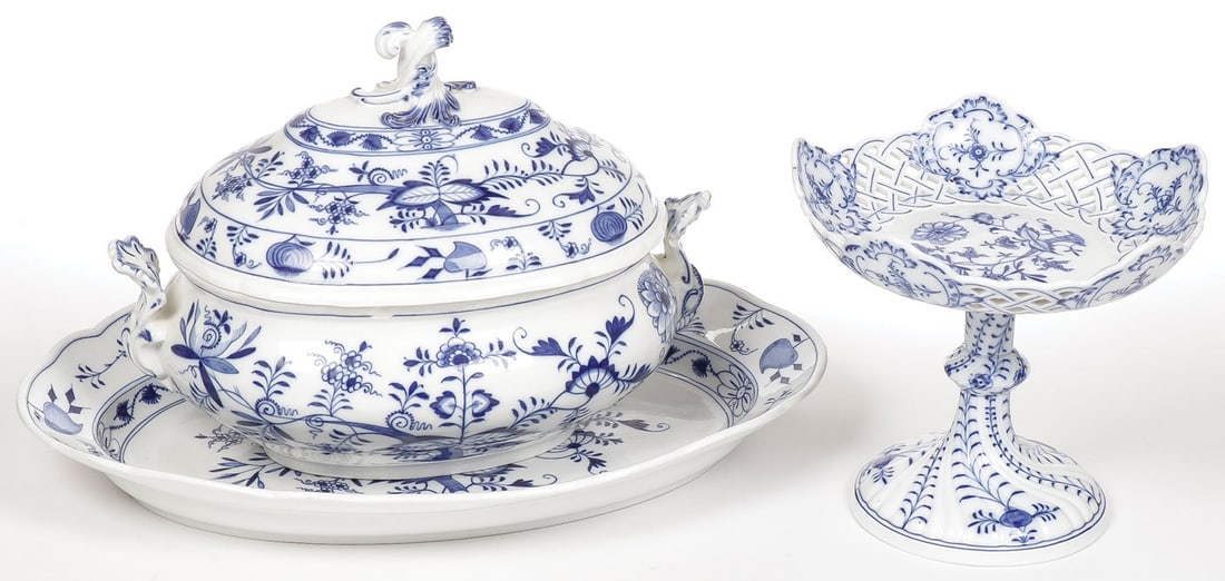 MEISSEN PORCELAIN GROUP: MEISSEN PORCELAIN GROUP Comprising a blue and white onion covered tureen with underplate and a footed compote with pierced rim. Tureen underplate length 18.75 inches, height of compote 9.25 inches. SH
