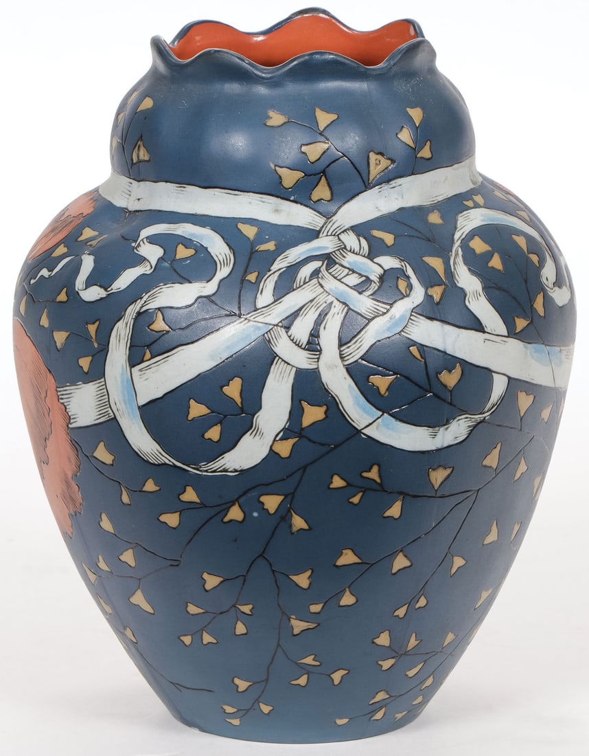 METTLACH ART NOUVEAU INCISED VASE: METTLACH ART NOUVEAU INCISED VASE Overall decorated with incised poppies, trailing vines, and ribbon with ruffled mouth. Underside with impressed castle mark, mold no. 2434. 6.75 inches (17cm) SHIPPIN