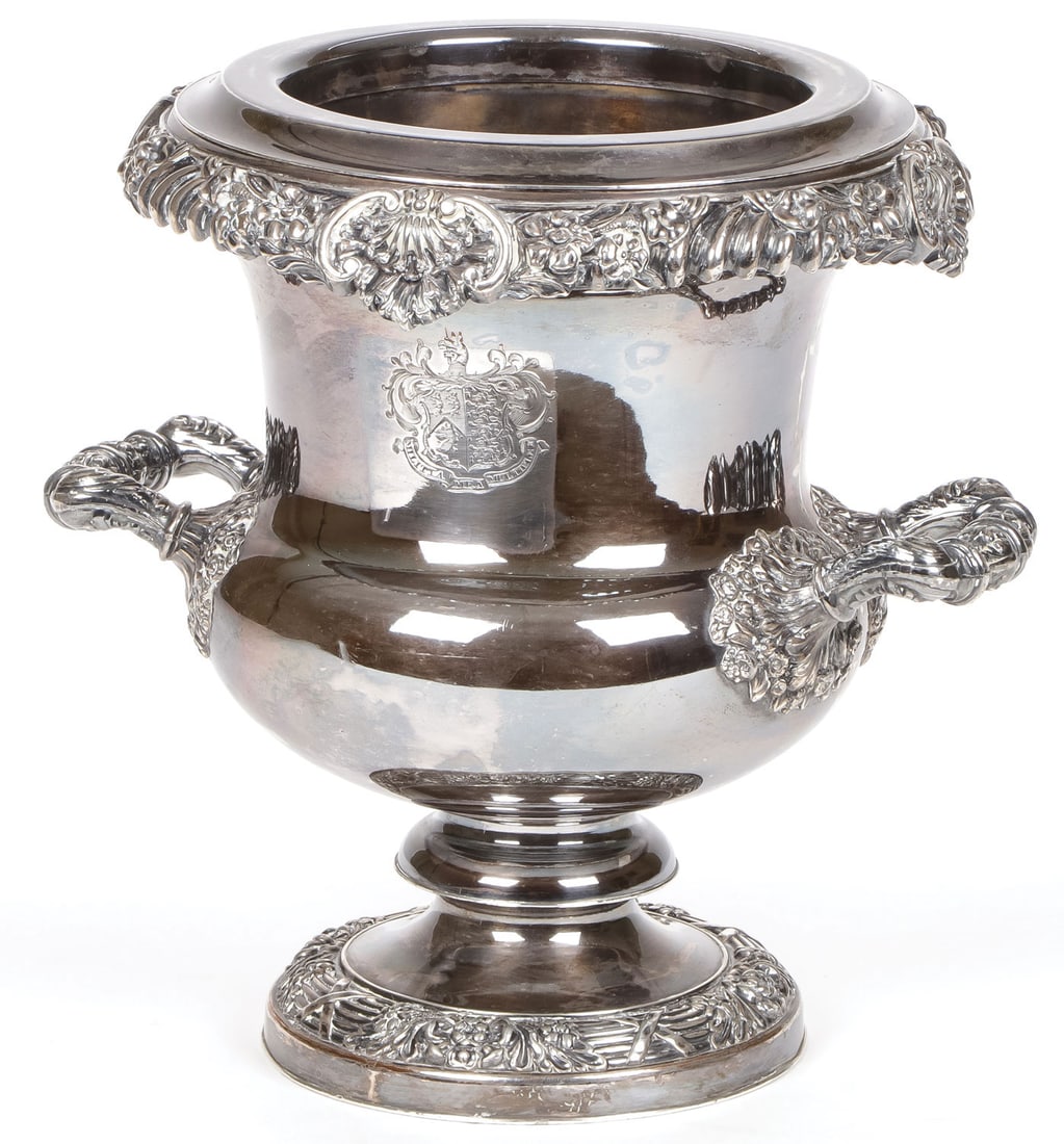 A SHEFFIELD PLATED WINE COOLER, 19TH C: A SHEFFIELD PLATED WINE COOLER, 19TH C Of traditional form with ornate repose banded rims and with double handles. Both sides engraved with a coat of arms engraved with Latin motto Militia Mea Multipl