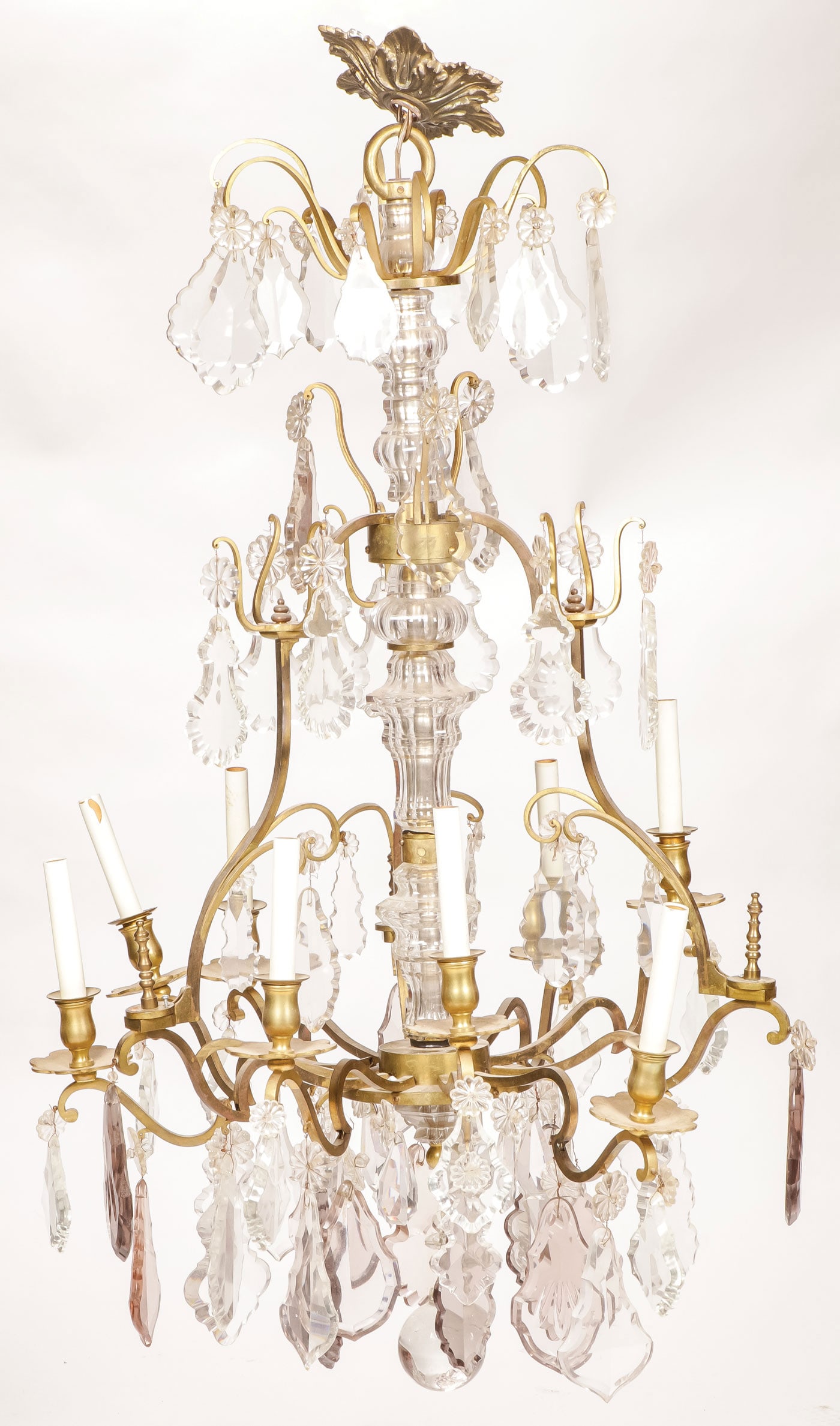 IMPRESSIVE BACCARAT CHANDELIER: IMPRESSIVE BACCARAT CHANDELIER Electrified with eight candle-style light sockets on scroll arms, the center section of glass baluster stacking sections and with cut beveled fiddleback prisms and roset