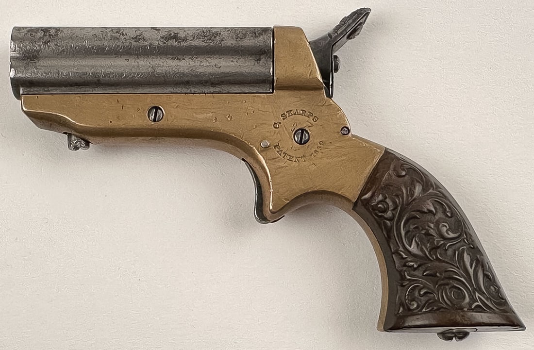 SHARPS 4 BARREL PEPPERBOX DERRINGER: SHARPS 4 BARREL PEPPERBOX DERRINGER. 2.5 inch barrel, Cal. 22 RF. S# 26978. The left side of the frame is stamped "C. SHARPS/ PATENT 1859", and strong "C. SHARPS & Co/ PHILADA. PA." stamped on the rig