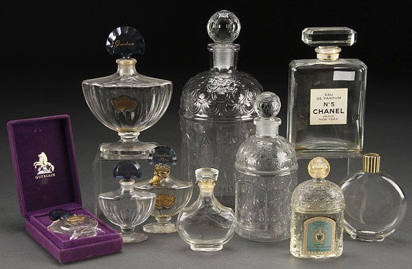 A GROUP OF TEN FRENCH CRYSTAL PERFUME BOTTLES: A GROUP OF TEN FRENCH CRYSTAL PERFUME BOTTLES, EARLY TO MID 20TH CENTURY. Comprising a Chanel No. 5, four Guerlain Shalimar including one in box, three Guerlain Imperiale and L'Air du Temps and Worth.