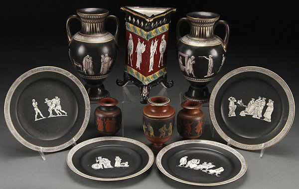 ENGLISH PRATTWARE POTTERY, 9 PIECES: A NINE PIECE GROUP OF ENGLISH PRATTWARE CLASSICAL DECORATED POTTERY, 19TH CENTURY. Comprising two handled vases and four matching plates, a turned polychrome redware vase with Orientalist scene, a pai