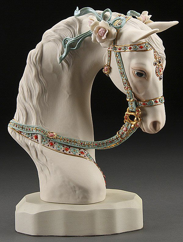CYBIS PORCELAIN BUST OF A HORSE: A LARGE CYBIS PORCELAIN BUST OF A HORSE, LAST QUARTER 20TH CENTURY. Finely decorated with an enameled and gilt bridle and rose blossoms, inscribed "Cybis-#322". Height 13 inches (33 cm).
