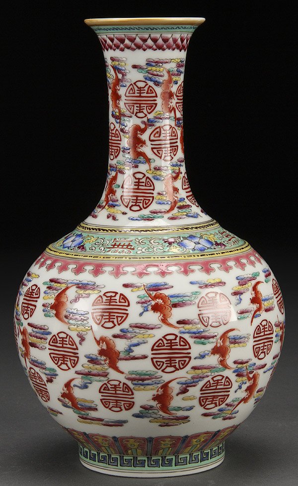 CHINESE FAMILLE ROSE PORCELIAN VASE: A CHINESE FAMILLE ROSE BATS AND MEDALLIONS PORCELAIN BOTTLE VASE, 19TH/20TH CENTURY. Decorated all over with flying bats, stylized clouds and medallions. Qianlong archaic seal mark in blue underglaze.