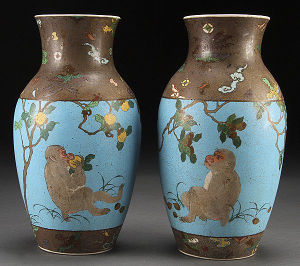 JAPANESE TOTAI CLOISONNE VASES, MEIJI, PAIR: A VERY FINE PAIR OF JAPANESE TOTAI CLOISONNÉ OVER PORCELAIN VASES, MEIJI PERIOD. Each decorated with scenes of a monkey below a fruit tree on a robin's egg blue enamel ground, the white glazed interi