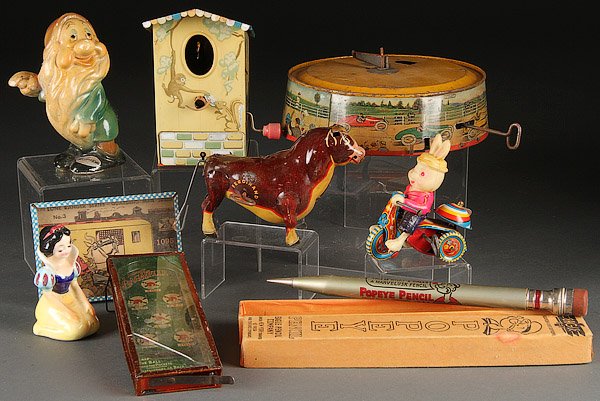 A VINTAGE TIN PLATE AND CHARACTER TOY GROUP: A VINTAGE TIN PLATE AND CHARACTER TOY GROUP, EARLY TO MID 20TH CENTURY. Nine pieces comprising a Popeye pencil- 1929 Eagle Pencil Company in original box, a Marx "Whee-Whiz" tin litho base, a San Japa