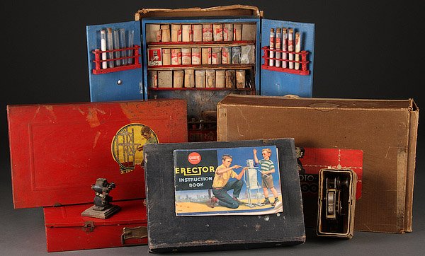A GILBERT ERECTOR SET AND TOY CHEMISTRY GROUP: A GILBERT ERECTOR SET AND TOY CHEMISTRY GROUP, EARLY TO MID 20TH CENTURY. Comprising two No 7 1/2 Engineer Sets, a wood cased Gilbert chemistry outfit (dated 1936), a cased Meccano construction kit (c