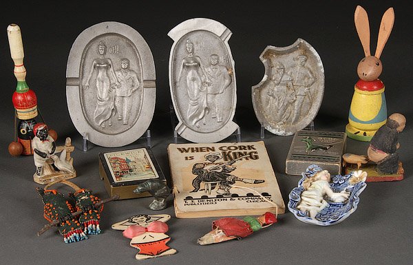 VINTAGE EROTIC & SUGGESTIVE HUMOR NOVELTY GROUP: A VINTAGE EROTIC AND SUGGESTIVE HUMOR NOVELTY GROUP, EARLY TO MID 20TH CENTURY. 16 pieces comprising three naughty reversible scene ashtrays, an embossed porcelain plaque, a scatological humorous figu