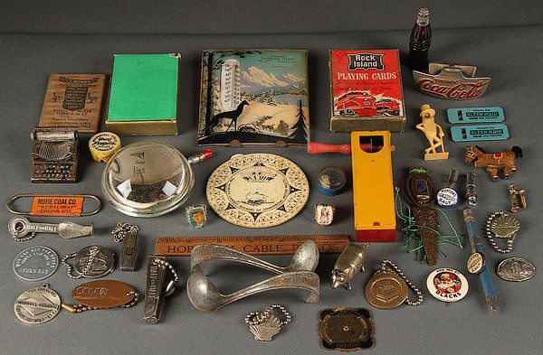 VINTAGE ADVERTISING PREMIUMS AND NOVELTIES: A COLLECTION OF VINTAGE ADVERTISING PREMIUMS AND NOVELTIES, EARLY TO MID 20TH CENTURY. 36 pieces including a Bissell dust mop paperweight, Coca Cola bottle opener, Niagara Falls souvenir pig sewing me