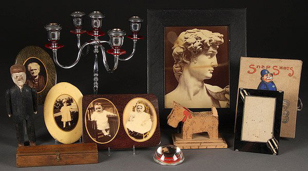 VINTAGE ART DECO FRAMES, PYROGRAPHY AND CELLULOID: VINTAGE ART DECO FRAMES, PYROGRAPHY AND CELLULOID PICTURE GROUP, 19TH/20TH CENTURY. Over twenty pieces including a Keystone chrome and red Bakelite candelabra, two Victorian flue covers, Art Deco fra