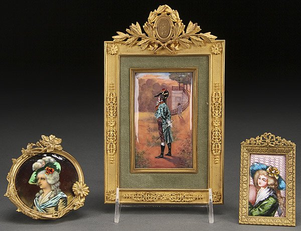 FRENCH LIMOGES COPPER & GILT BRONZE PORTRAITS: A THREE PIECE GROUP OF FRENCH LIMOGES ENAMELED COPPER AND GILT BRONZE MOUNTED PORTRAITS. Comprising a dandy, height 8 inches (20 cm); a young beauty on engine turned ground, height 3.75 inches (9.5 cm