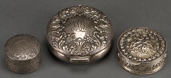 A TIFFANY & CO. STERLING LIDDED SNUFF BOX: A TIFFANY & CO. STERLING LIDDED SNUFF BOX, LATE 19TH CENTURY. With repoussed and scrolled acanthus lid and gilt interior, marked Tiffany & Co. 13171 Maker's 9730 Sterling. Diameter 2.25 inches (6 cm).
