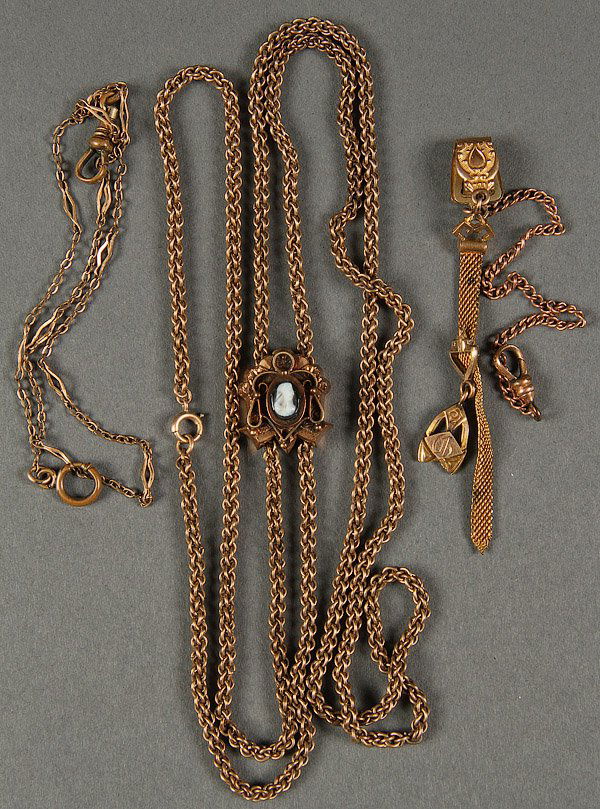 LADIES VICTORIAN WATCH SLIDE & CHAIN: A VERY FINE LADIES VICTORIAN WATCH SLIDE AND CHAIN WITH CARVED SHELL CAMEO. Length 21 inches. Together with two additional gold filled watch chains.