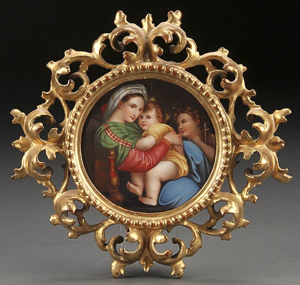 PORCELAIN PLAQUE, MADONNA DELLA SEDIA: AFTER RAPHAEL, MADONNA DELLA SEDIA, ITALIAN HAND PAINTED PORCELAIN PLAQUE, LATE 19TH CENTURY. Contained in a carved wood and gilt rococo frame. The plaque 4.75 inches (12 cm) diameter, 9 inches x 9.5 
