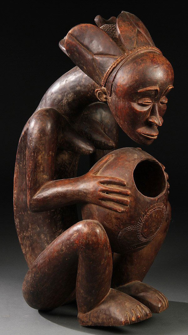A CARVED WOOD AFRICAN RELIQUARY FIGURE Sep 19, 2012 Jackson's