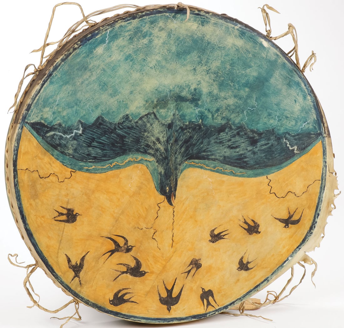 ATTRACTIVE GHOST DANCE DRUM: ATTRACTIVE GHOST DANCE DRUM. Wood, rawhide, and pigment. The front decorated with an image of Thunderer, mythical ruler of the Skyworld, streaks of lightening shooting from the creature's wings, eyes,