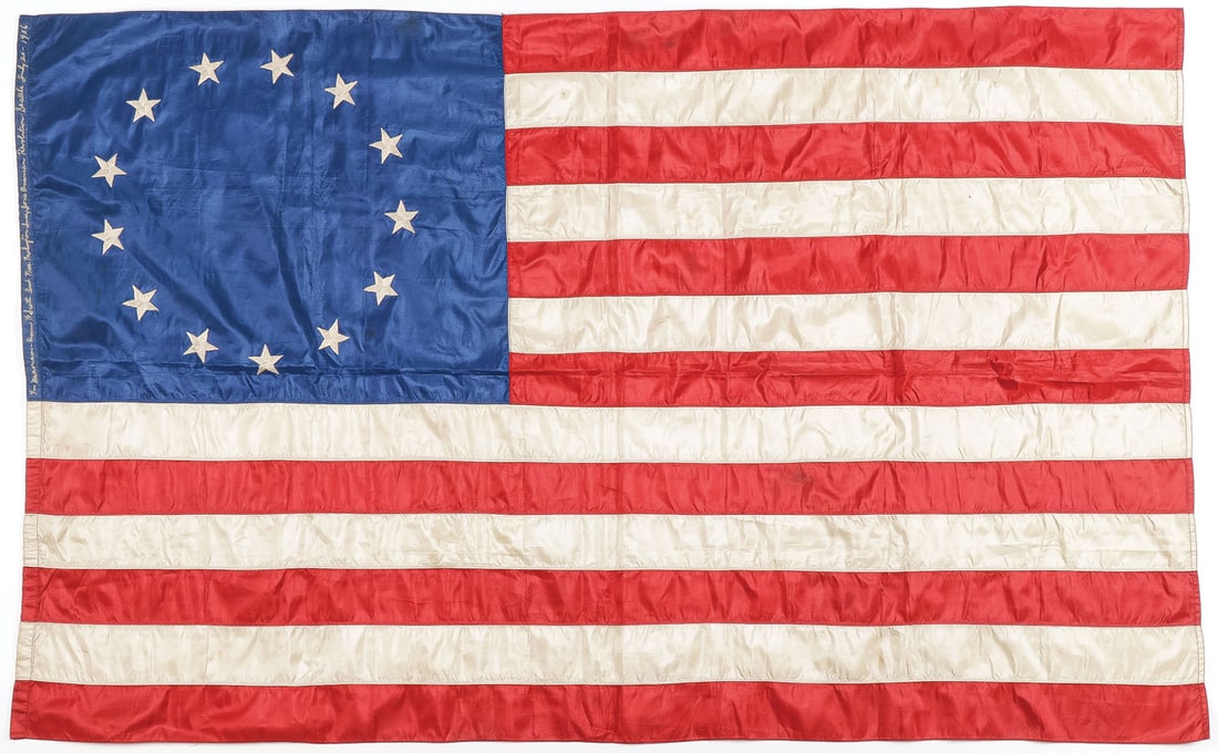 RARE 13 STAR SILK PRESENTATION FLAG: RARE 13 STAR SILK PRESENTATION FLAG, ATTRIBUTED TO ROSS FAMILY. Comprising a very fine U.S. Colonial style 13-star silk flag with hand embroidered stars on a machine sewn silk flag. The hoist with emb