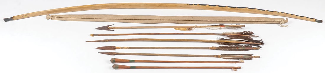 ARROW AND BOW GROUP: ARROW AND BOW GROUP. Comprising four vintage Sioux style arrows with metal trade points, sinew-wrapped and fletched. Another with stone point, and two stunner arrows, together with two wood bows. The