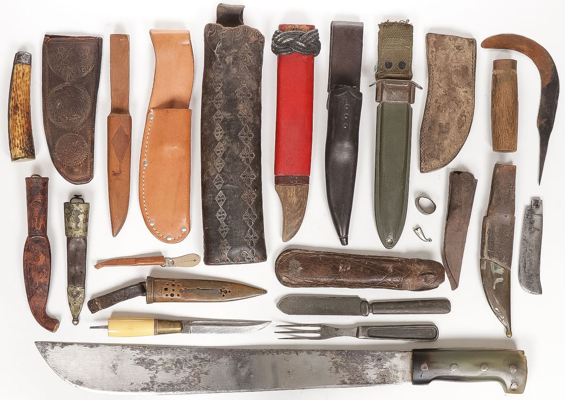 VINTAGE MACHETE, SHEATHS AND KNIFE PARTS GROUPING: VINTAGE MACHETE, SHEATHS AND KNIFE PARTS GROUPING. Comprising 18 individual pieces including a good Collins & Co. WWII horn handled machete, a USM8 bayonet sheath, as well as various other sheaths, pa