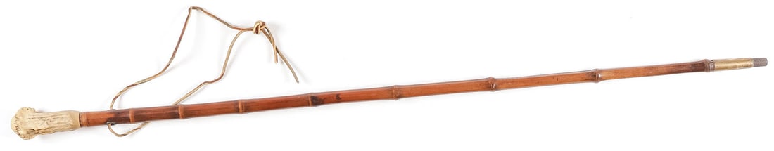 VINTAGE GENTLEMAN'S BAMBOO STILETTO CANE, 19th C: VINTAGE GENTLEMAN'S BAMBOO STILETTO CANE, 19th C. Bamboo shaft with brass tip and staghorn handle with engraved escutcheon holding a three-sided blade. Blade length 13.5 inches, overall length 33.25 i