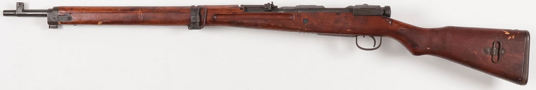 WWII JAPANESE NAGOYA TYPE 99 ARISAKA RIFLE: WWII JAPANESE NAGOYA TYPE 99 ARISAKA RIFLE. WWII Japanese Nagoya Type 99 7.7 caliber bolt action Arisaka rifle. Protected blade front sight. Adjustable rear sight. Ground Mum. Wood stock. Steel butt p