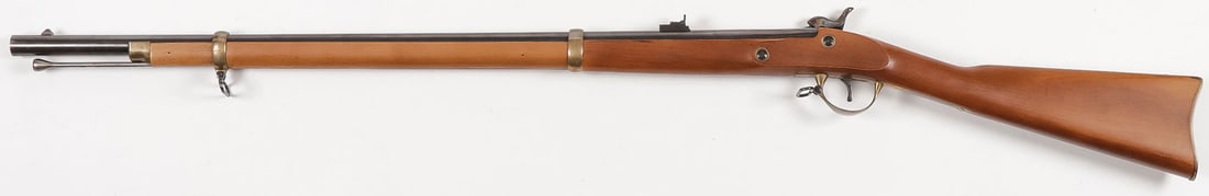 REPLICA M 1863 US ZOUAVE RIFLE: REPLICA M 1863 US ZOUAVE RIFLE. A two-band musket with side mount bayonet lug near muzzle, patch box rear adjustable site, swivel sling mounts in 58 caliber. Serial number #7380. Overall length 48.5 i