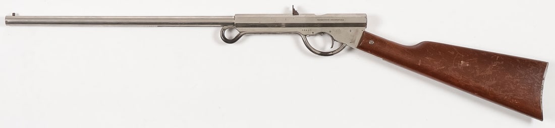 VINTAGE QUACKENBUSH NO. 2 AIR RIFLE: VINTAGE QUACKENBUSH NO. 2 AIR RIFLE. Spoon loading port behind rear sight, nickel finish and walnut stock. Retains 90% original nickel everywhere except the lever shows a few spots of toning. 20-inch